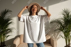 Woman wearing white t shirt and hat Product Image 1