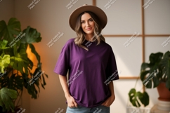 Woman wearing purple t-shirt and hat fashion Product Image 1
