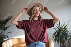Woman wearing maroon t shirt and hat t-shirt blonde Product Image 1