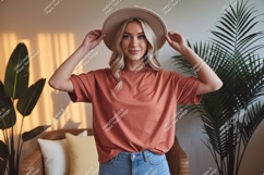 Woman wearing terracotta t shirt and hat image Product Image 1