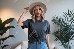 Woman wearing grey t shirt and hat image Product Image 1