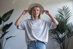 Woman wearing grey t shirt and hat image Product Image 1