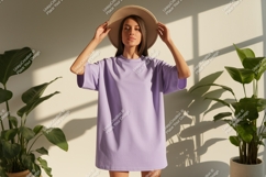 Woman wearing lavender t shirt and hat image Product Image 1