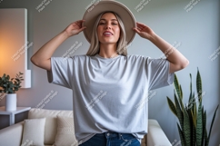 Woman wearing grey t shirt and hat t-shirt casual Product Image 1