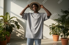 Man wearing grey t shirt and hat image Product Image 1