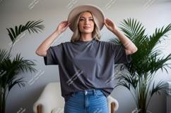 Woman wearing grey t shirt and hat image Product Image 1