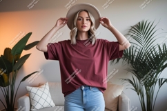 Woman wearing maroon t shirt and hat image Product Image 1