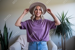 Woman wearing purple t shirt and hat mockup image Product Image 1