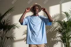 Man wearing light blue t shirt and hat image Product Image 1