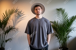 Man wearing grey t shirt and hat image Product Image 1