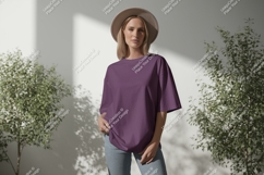 Woman wearing purple t shirt and hat image Product Image 1