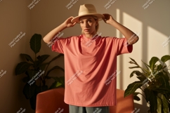 Woman wearing coral t shirt and beige hat image Product Image 1