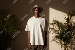Man wearing white t-shirt and hat plants Product Image 1