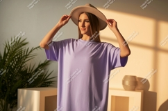 Woman wearing lavender t-shirt and hat Product Image 1