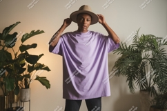 Person wearing lavender t shirt and hat image Product Image 1
