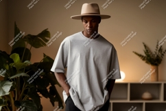 Man wearing grey t-shirt and hat indoor Product Image 1