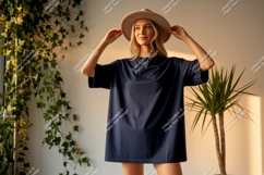 Woman wearing dark blue t shirt and hat Product Image 1