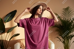 Woman wearing magenta t-shirt and hat fashion Product Image 1