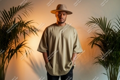 Man wearing tan t shirt and hat image Product Image 1