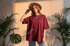Woman wearing maroon t shirt and hat image Product Image 1