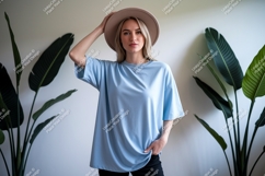 Woman wearing blue t shirt and hat image Product Image 1