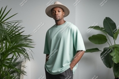 Man wearing mint t shirt and hat image Product Image 1