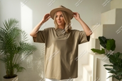 Woman wearing plain olive green t shirt and hat image Product Image 1