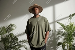Man wearing olive green t shirt and tan hat image Product Image 1