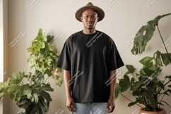 Man wearing black t-shirt and hat plants Product Image 1