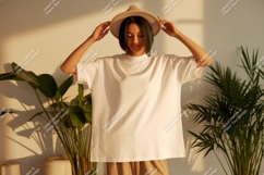 Woman wearing white t-shirt and hat Product Image 1