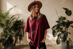 Woman wearing maroon t shirt and hat image Product Image 1
