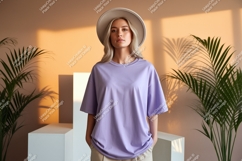 Woman wearing lavender t shirt and hat image Product Image 1