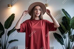Woman wearing red t-shirt and hat fashion Product Image 1