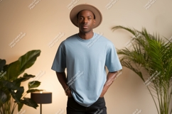 Man wearing blue t shirt and hat image Product Image 1