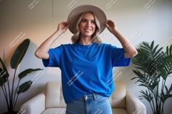 Woman wearing blue shirt and hat casual Product Image 1