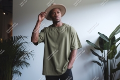 Man wearing olive green t-shirt and hat image Product Image 1