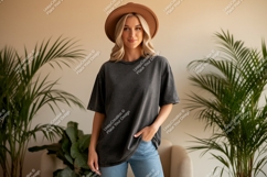 Woman wearing dark grey t shirt and brown hat plants Product Image 1