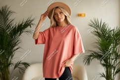 Woman wearing coral t shirt and hat image Product Image 1