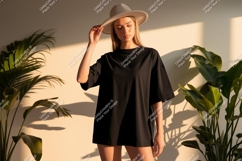 Woman wearing black t-shirt and hat Product Image 1
