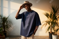 Man wearing hat and navy t shirt image Product Image 1