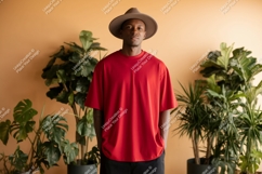 Man wearing red shirt and hat plants Product Image 1