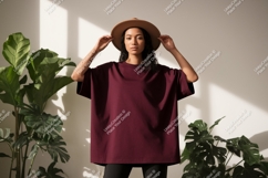 Woman wearing maroon t shirt and hat image Product Image 1
