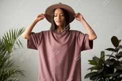 Woman wearing brown hat and pink dress image Product Image 1