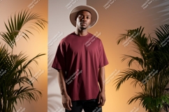 Man wearing maroon t shirt and hat image Product Image 1