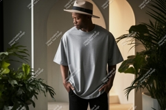Man wearing grey t shirt and hat image Product Image 1