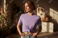 Woman wearing lavender t shirt and jeans image Product Image 1