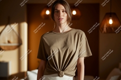 Woman wearing khaki t shirt tied knot image Product Image 1