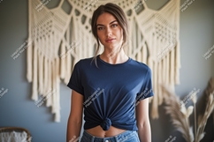 Format: Title: Woman wearing navy t shirt and jeans Product Image 1