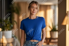 Woman wearing blue t shirt and jeans image Product Image 1