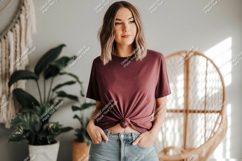 Woman wearing maroon t shirt and jeans image Product Image 1
